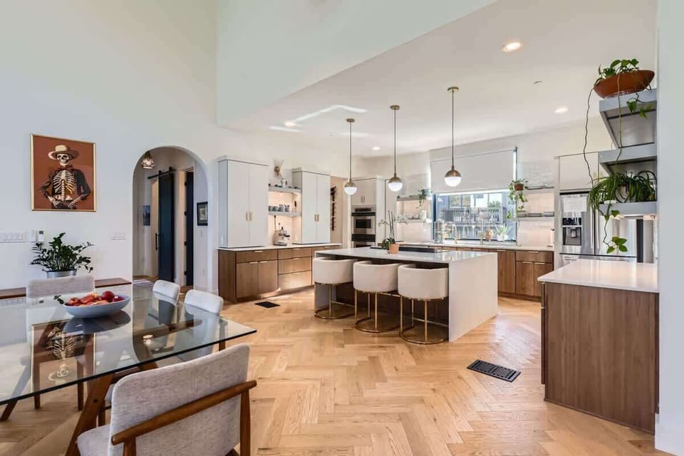 The open-concept dining area flows seamlessly from the kitchen, making group meals a breeze.