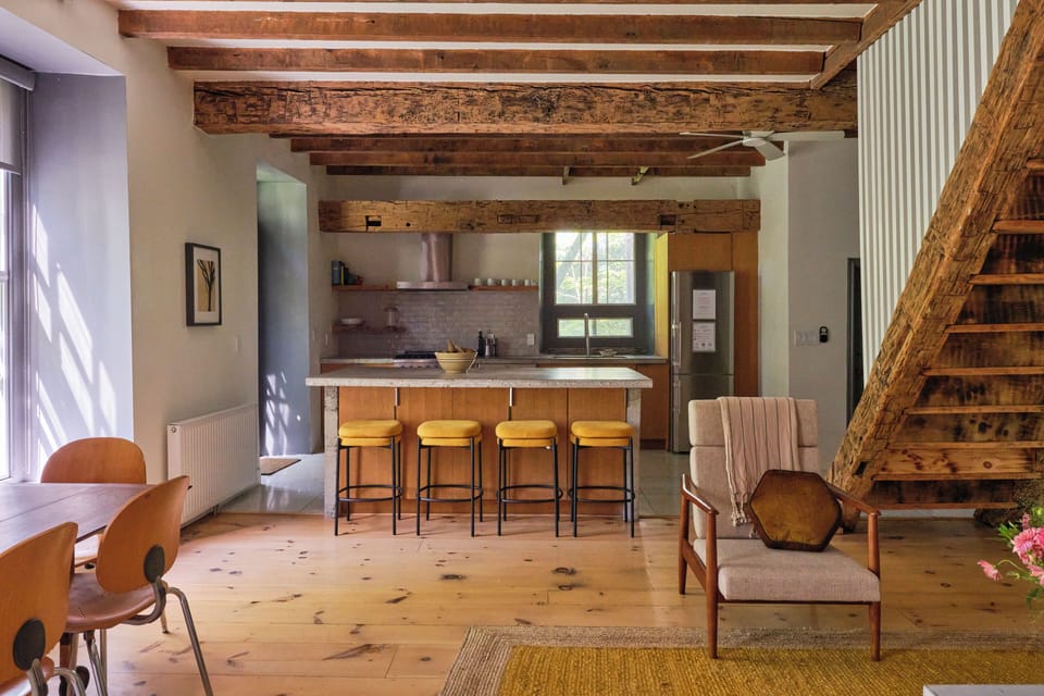 A view of the kitchen and island seating. Cook up your favorite comfort foods! 