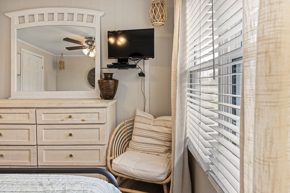Relax in this cozy seating area, the perfect spot for morning coffee or evening unwinding.