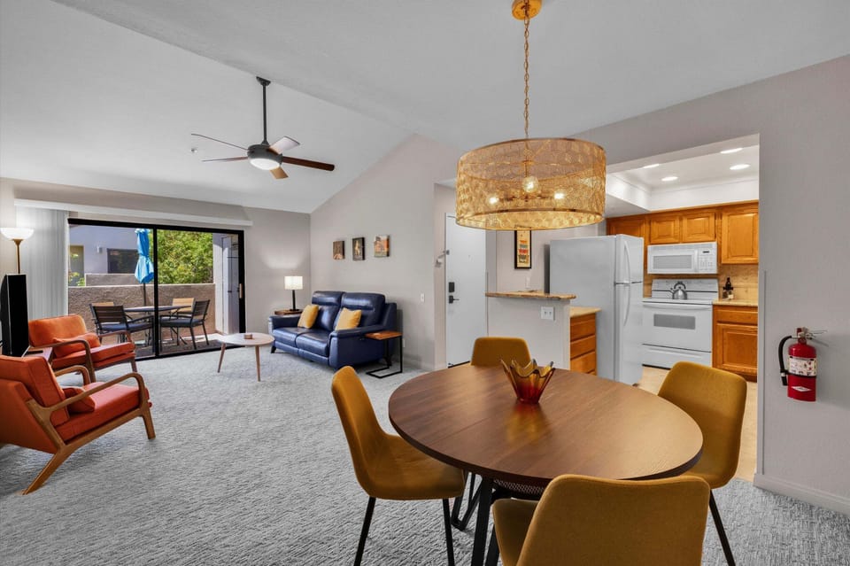 Open dining and living space with inviting condo layout