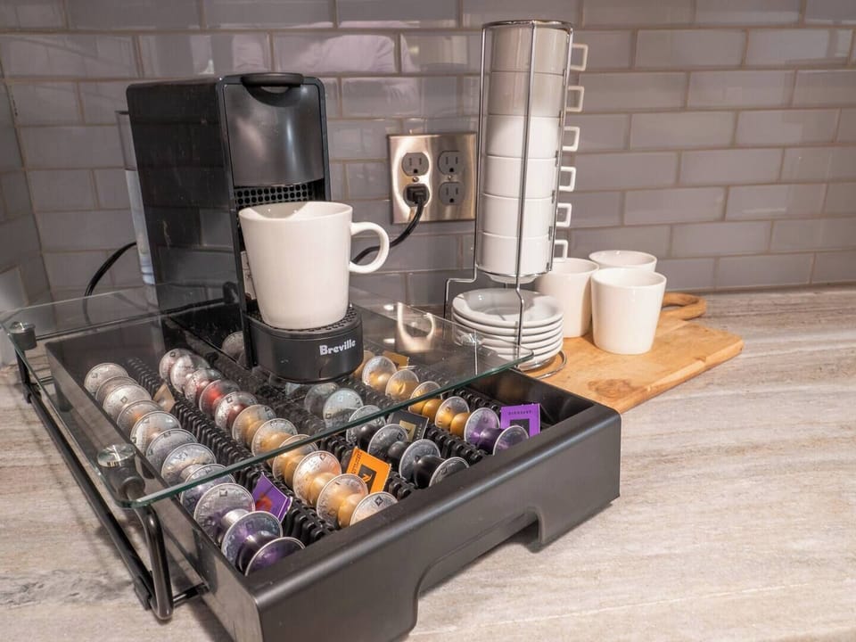 Nespresso machine with a selection of flavored coffees & espressos 