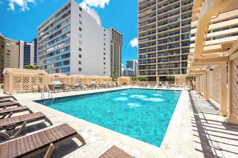 Dive into relaxation! Unwind and refresh in this sparkling swimming pool -- the perfect oasis for sun-soaked days and serene evenings.