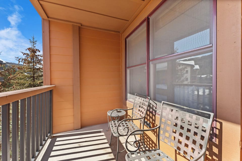 Private balcony with outdoor seating.