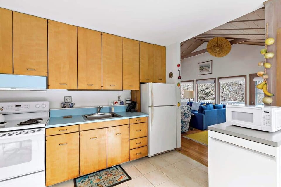 The fully stocked kitchen has all the cooking amenities and modern appliances you need