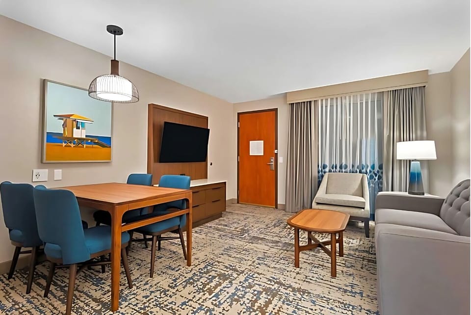 Gather for meals and lounge comfortably in a spacious suite.