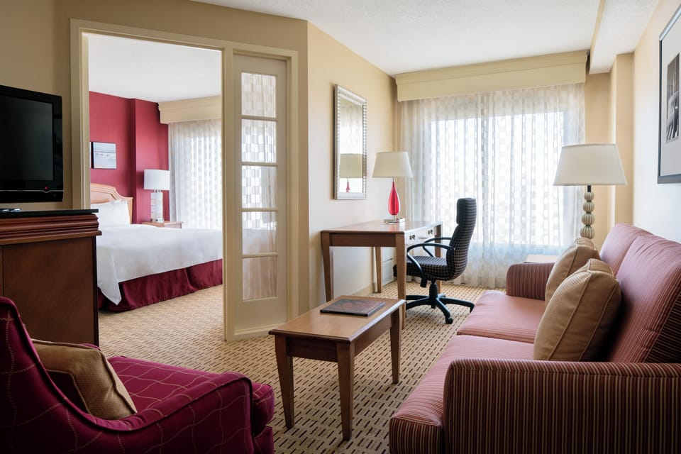 Stretch out in your private suite with workspace and lounge.