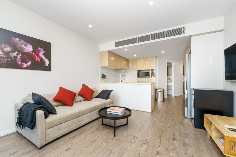 Unwind in this cosy lounge room, complete with a Smart TV for all your entertainment needs, making it the perfect spot to relax.