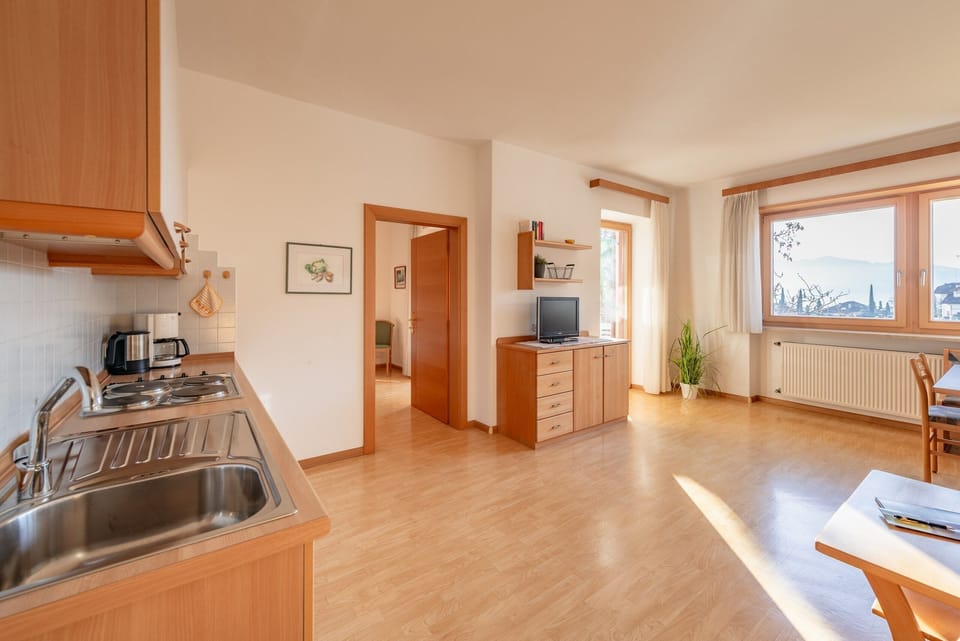 Kitchen with hob and coffee machine
