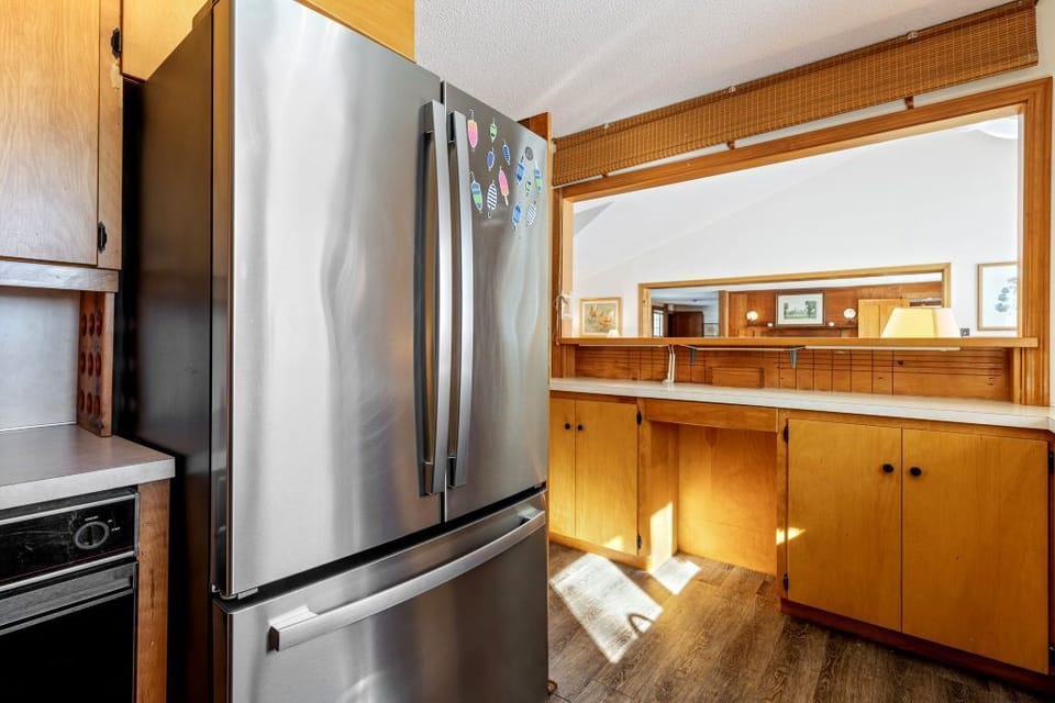 A fully equipped kitchen with timeless charm and all cooking necessities.