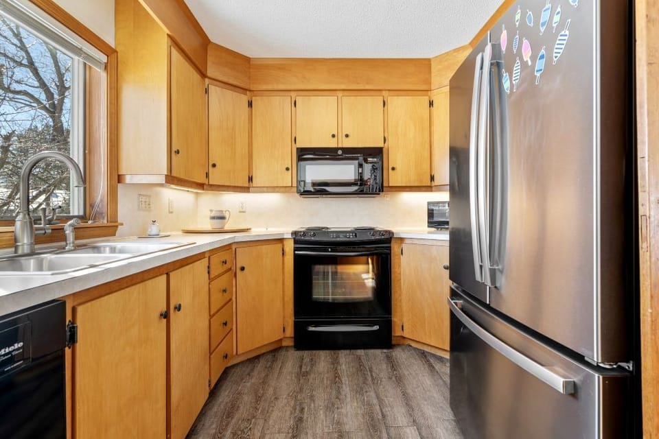 A fully equipped kitchen with timeless charm and all cooking necessities.