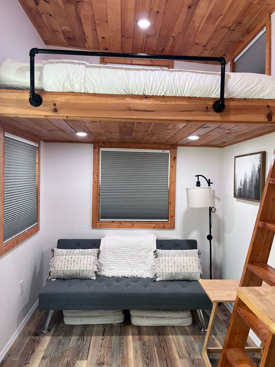 Living area with loft bed over