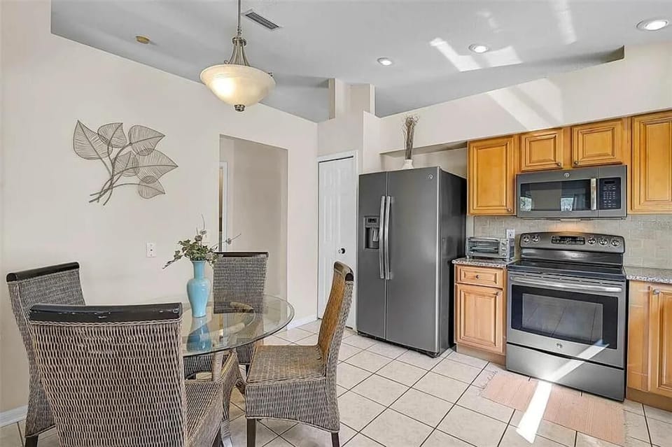 Bright kitchen with modern appliances and cozy dining nook