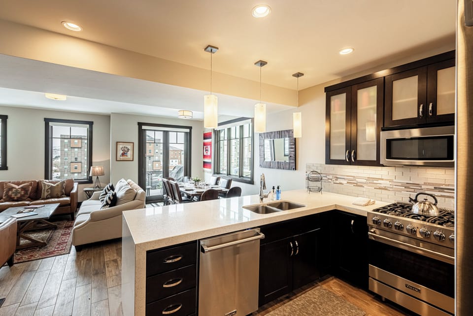 Fully Equipped Kitchen with stainless steel appliances and double sink