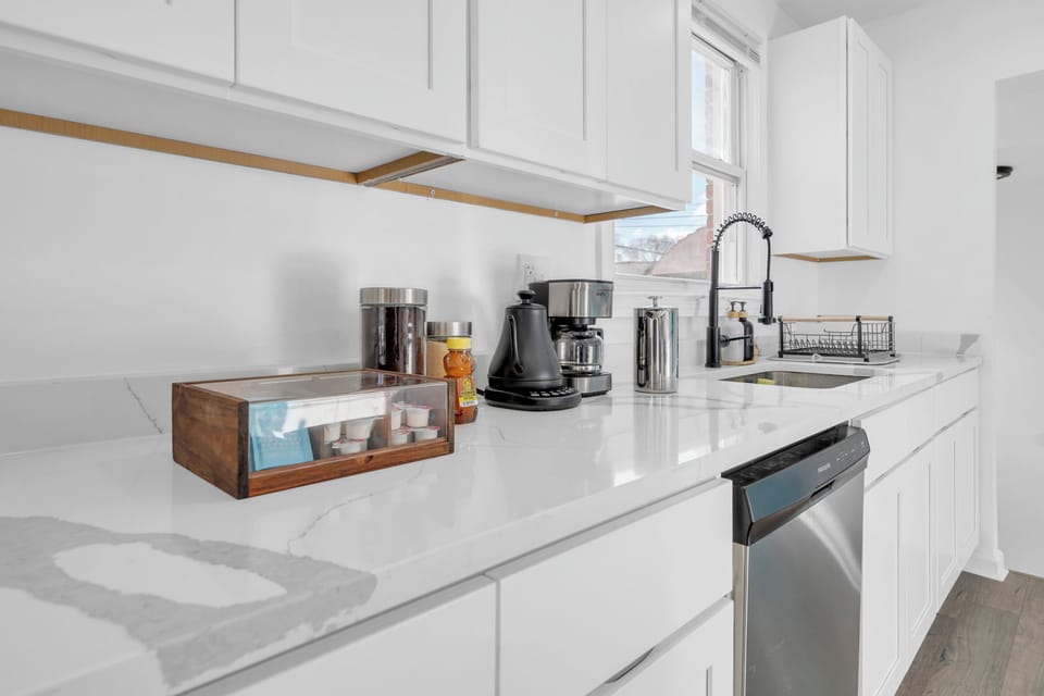 Coffee station with drip maker, French press, electric kettle, teas, creamer