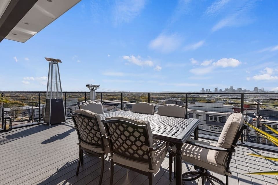 Rooftop floor has a full bath, elevator access, kitchenette, daybed with pullout trundle bed (sized XL twin).

4th floor outdoor roof-deck is half covered with an 85" flatscreen TV, fire pit, 2 heaters, electric smoker, dining room, & view finder.
