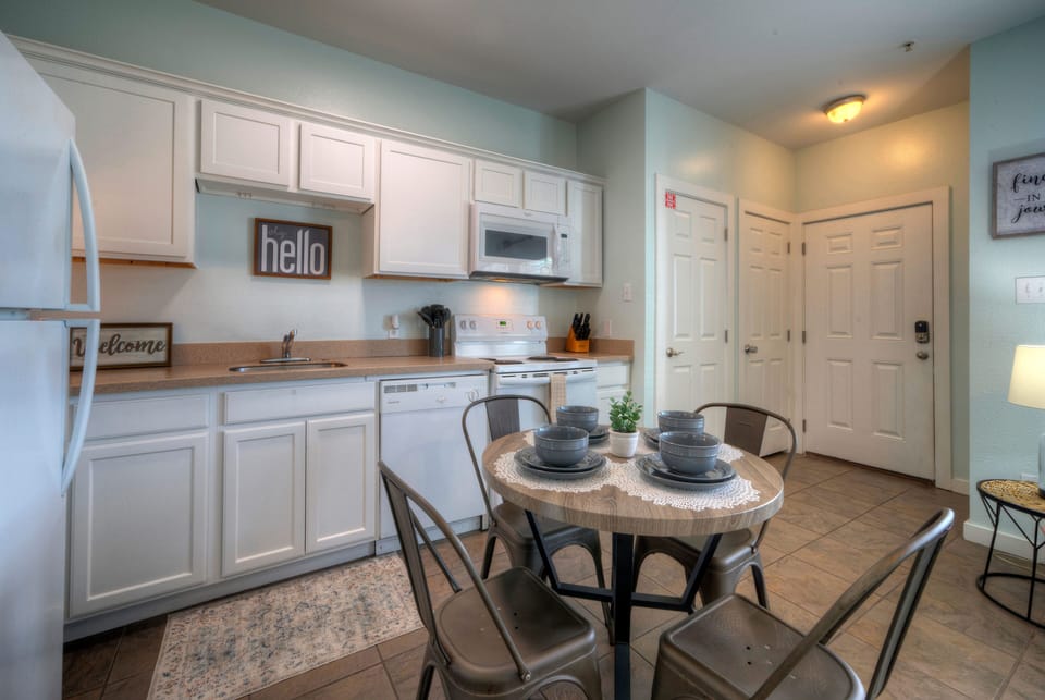 Gather around for meals and memories in this welcoming dining area.