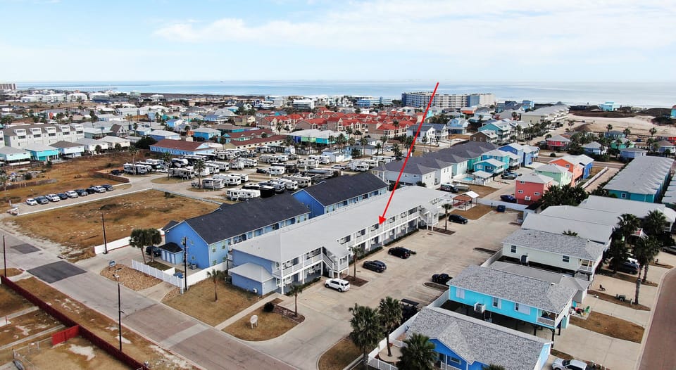 Get a bird’s-eye view of the neighborhood, with an arrow highlighting the perfect spot where your getaway awaits.