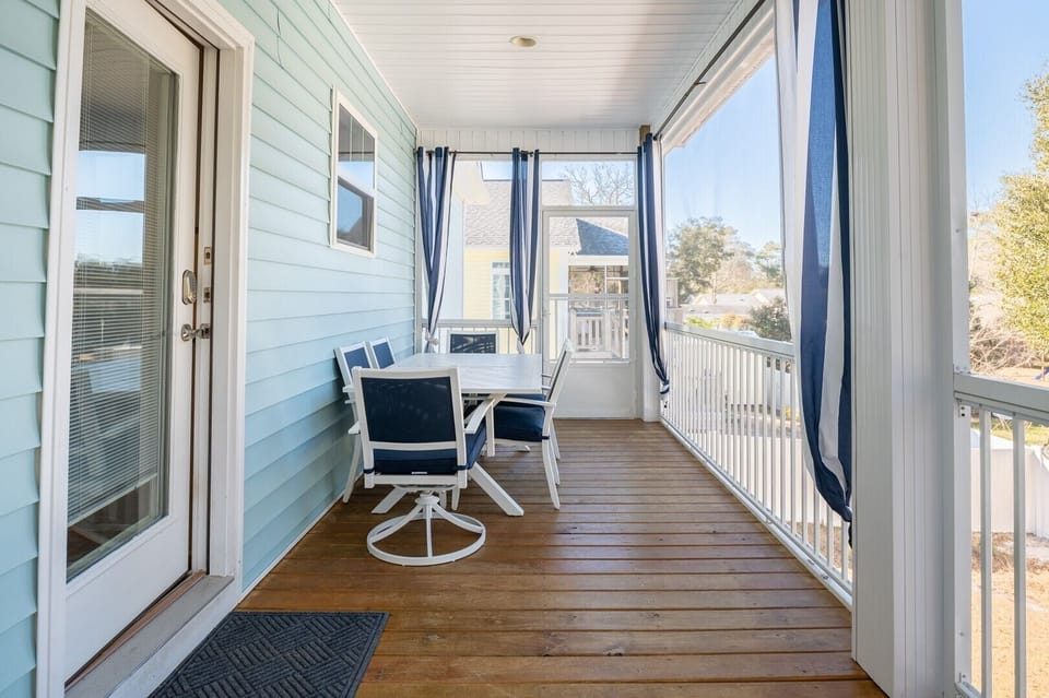 Screened in Back Porch with Shade Curtains