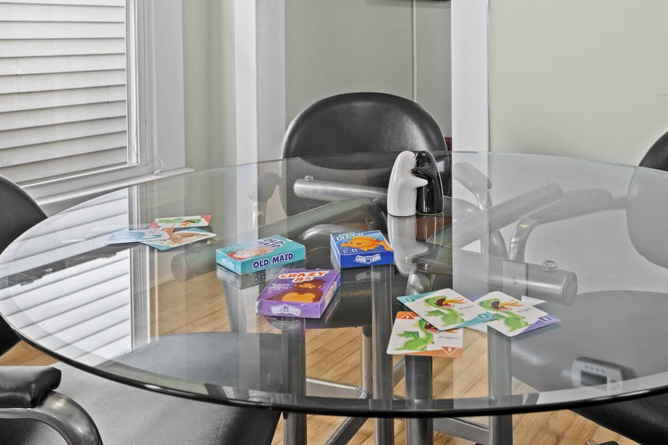 Kitchen 1: A cozy seating area perfect for enjoying meals or playing board games!