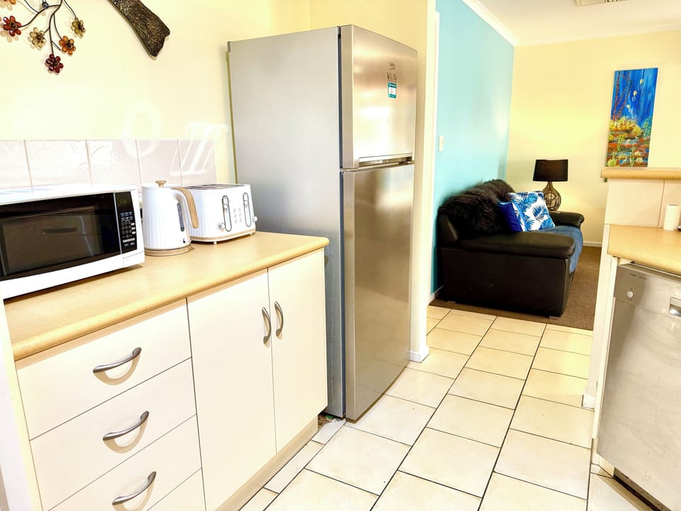 Fully Equipped Kitchen & Dining
Includes walk-in pantry, full-sized fridge, cooktop, oven, dishwasher, and generous bench space—plus indoor and outdoor dining zones.