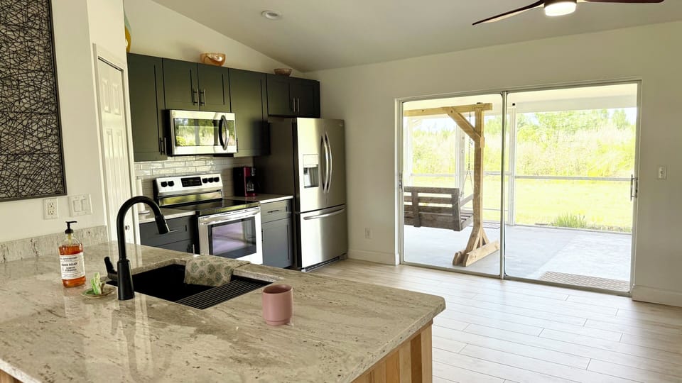 Enjoy the perks of a fully renovated kitchen, complete with a coffee maker.
