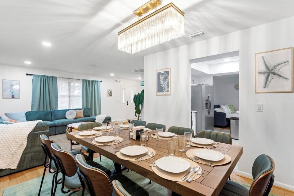 Everyone sits and eats together at the dining table for 10!