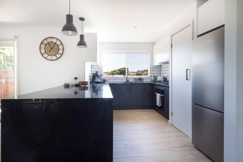 Brew your morning coffee with the espresso machine or cook up a feast using the oven in the kitchen.
