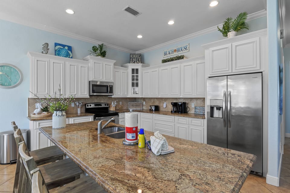 Large kitchen and island with seating
