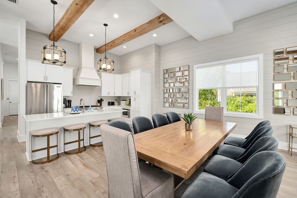 A stunning dining area with seating for eight, plus four at the kitchen island.