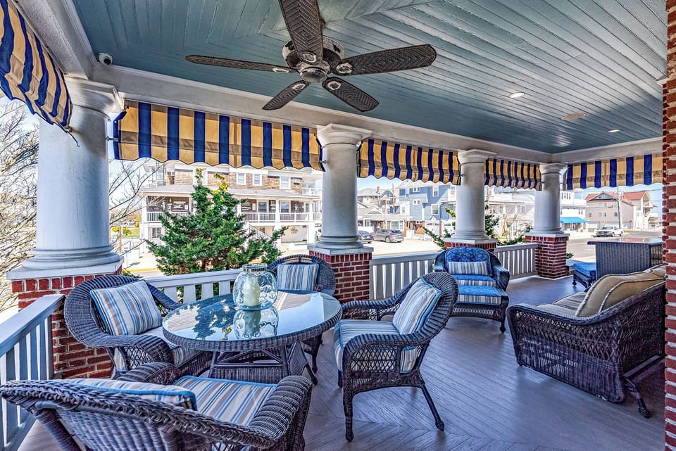 Covered porch area with lots of seating!
