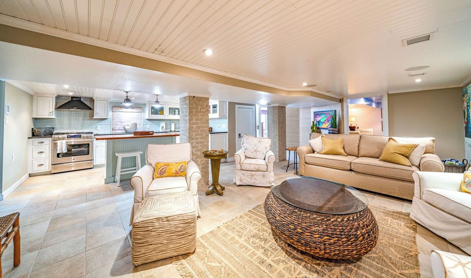 Living room area with lots of plush seating
