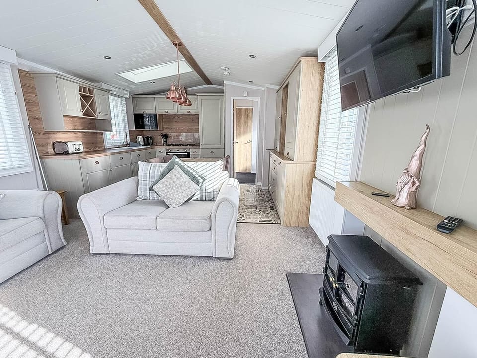 The caravan living area is perfect for quality time, board games, or simply putting your feet up with a cup of tea while recounting the day's adventures in Hunstanton.