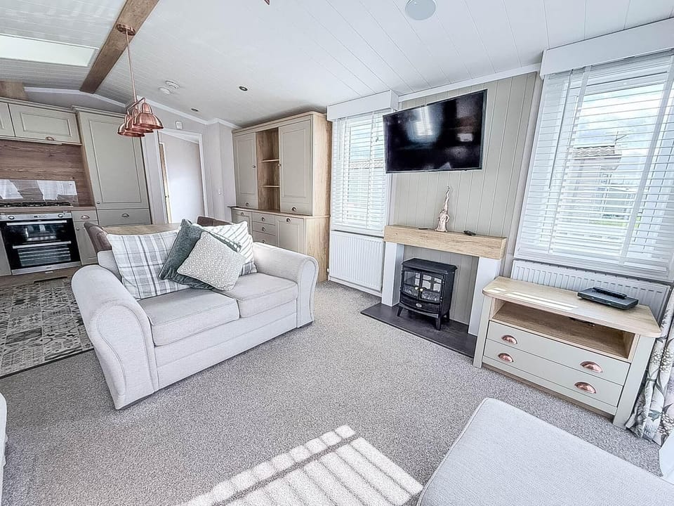 The caravan living area is perfect for quality time, board games, or simply putting your feet up with a cup of tea while recounting the day's adventures in Hunstanton.