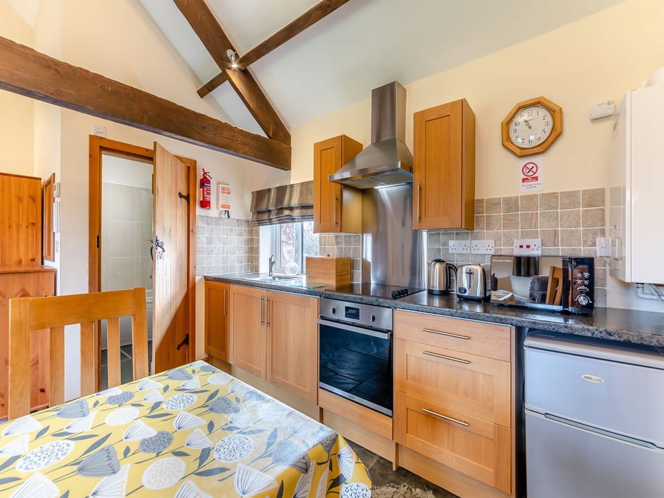 Kitchen | Eight Byre - Dickinson Place Holiday Cottages, Allonby