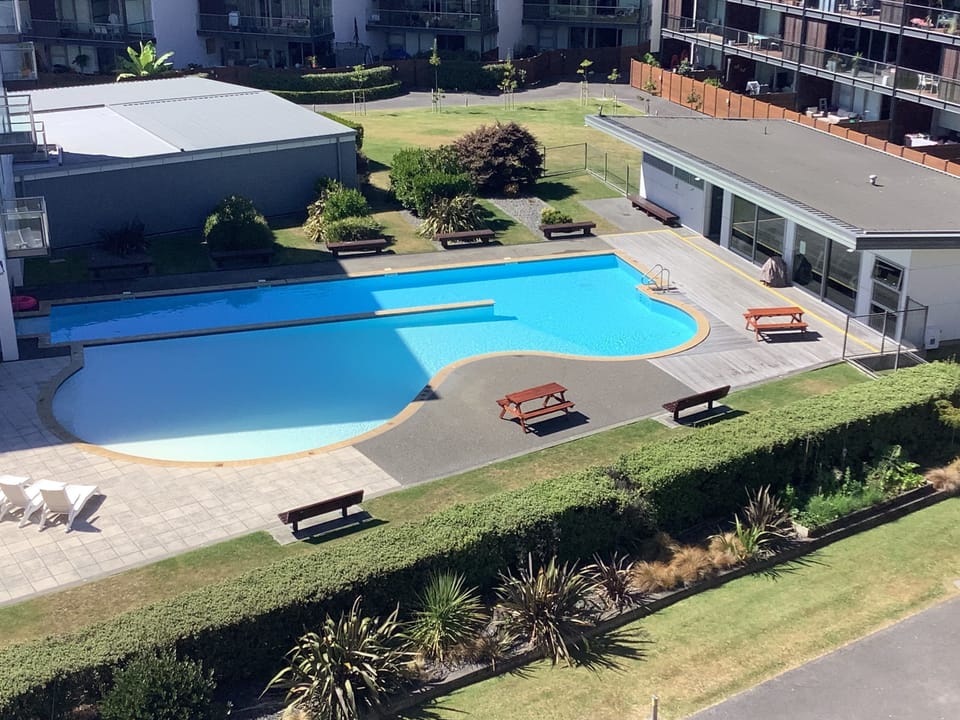 Heated pool next to full gym