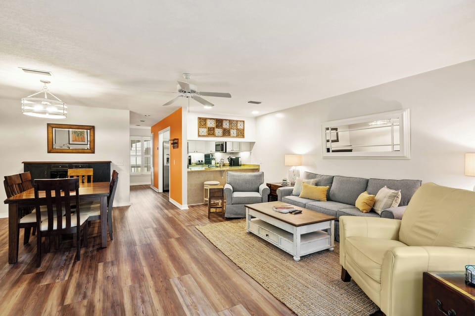 Spacious open living room with ample seating for the whole family