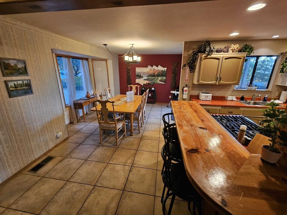 Dining room table and kitchen bar with seating