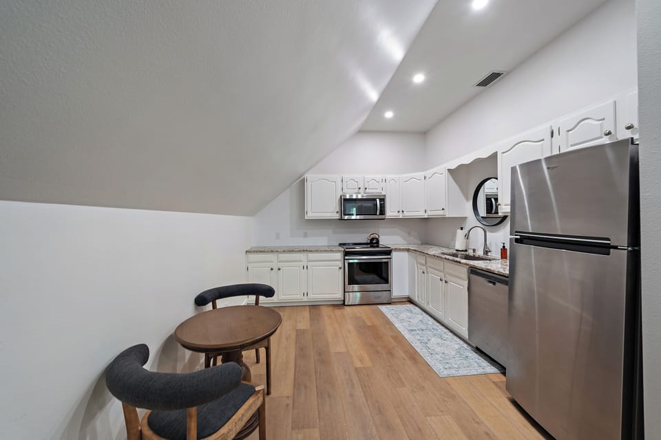 Small kitchen space located in the game room.