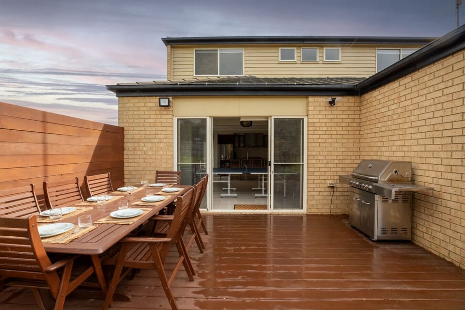 Private outdoor deck with dining area and BBQ—ideal for entertaining