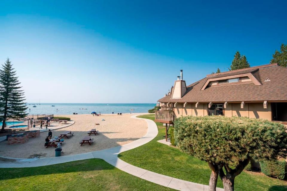 Stroll from the grounds to sandy beach and blue water.