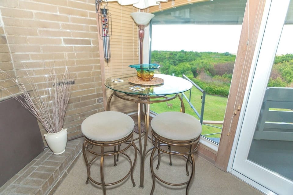 Toast sunsets at the bistro table overlooking green views.