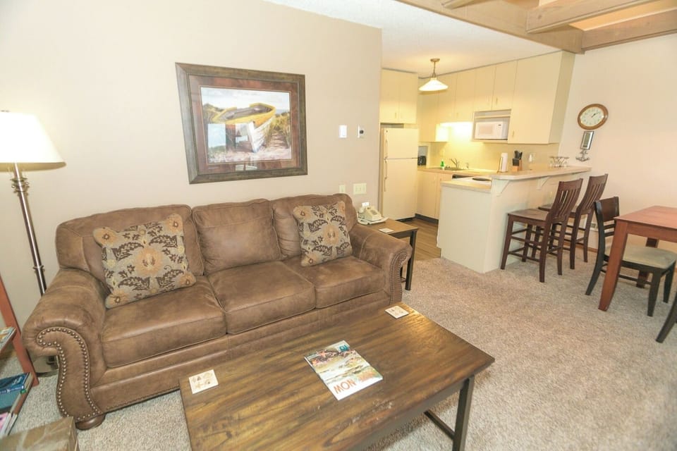 Unwind on the plush sofa after a day exploring.