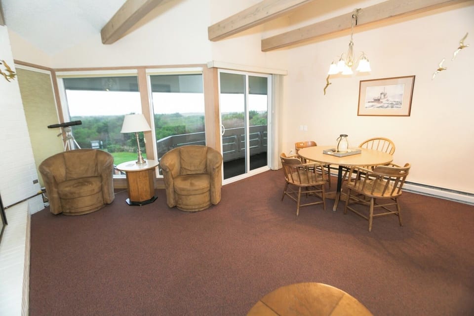 Unwind in the airy lounge with calming balcony views.