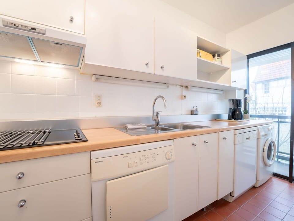 Kitchen, Countertop, Kitchen Appliance, Major Appliance, Flooring, Cabinetry, Interior Design, Kitchen Sink, Wood, Floor