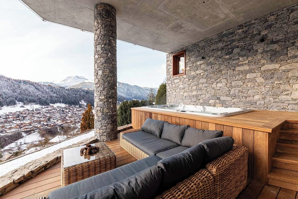 Covered seating area with the 9 seater hot tub by Wellis.