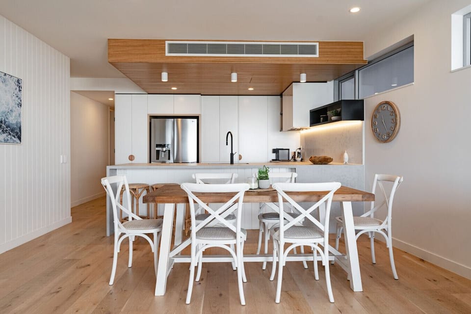 Open plan kitchen, dining and living spaces