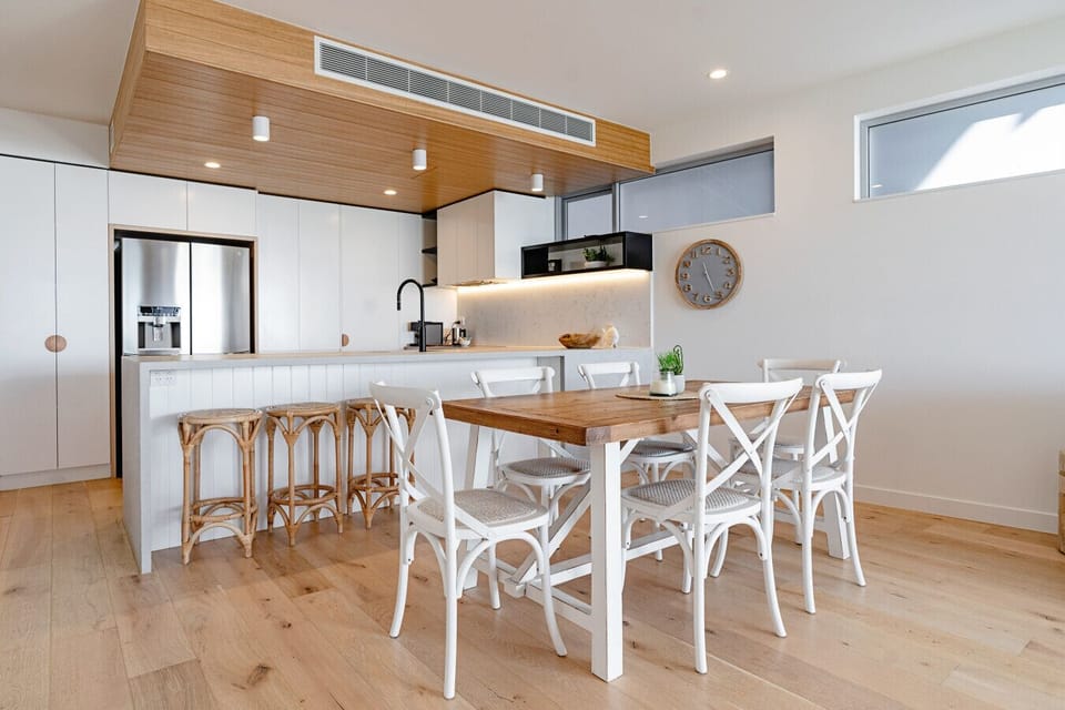 Open plan kitchen, dining and living spaces