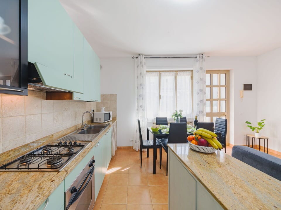 Furniture, Kitchen, Interior Design, Flooring, Countertop, Wood, Home, Floor, Apartment, Room