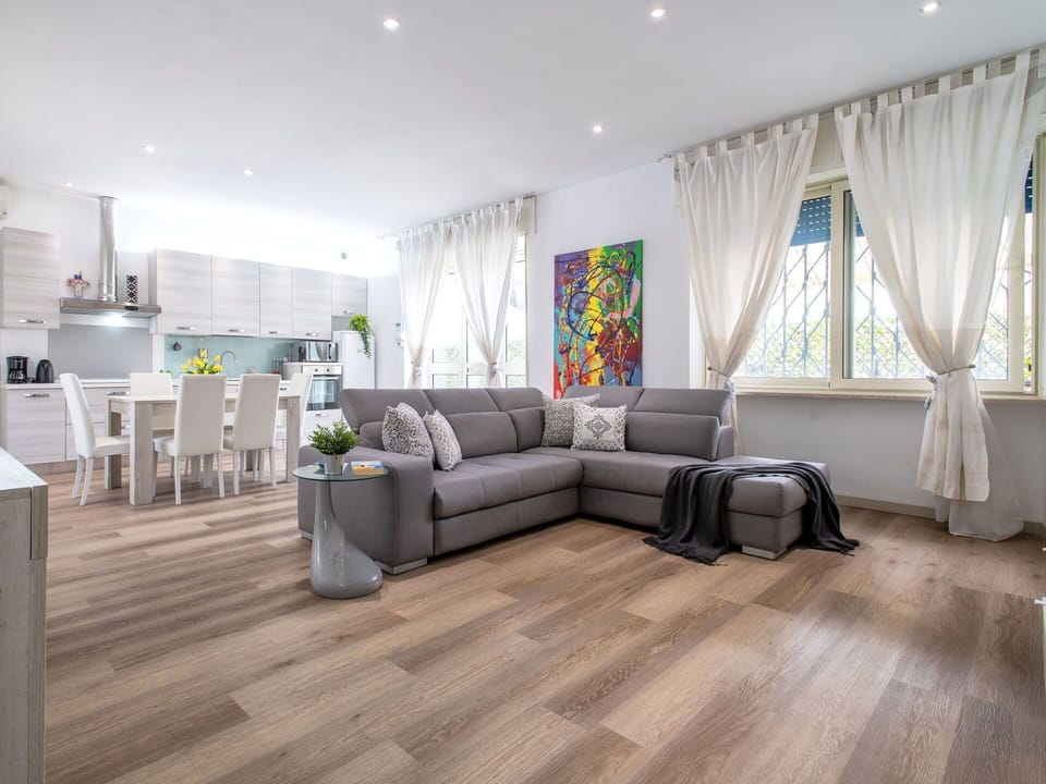 Flooring, Wood Flooring, Floor, Interior Design, Furniture, Wood, Laminate Flooring, Living Room, Couch, Home