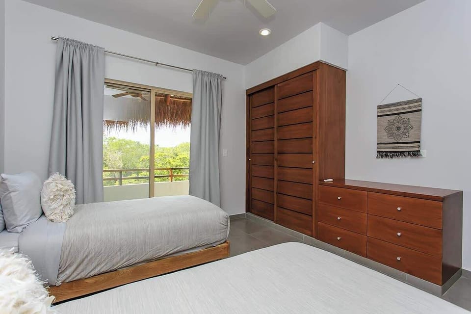Guest Bedroom with Two Twin Beds & Balcony